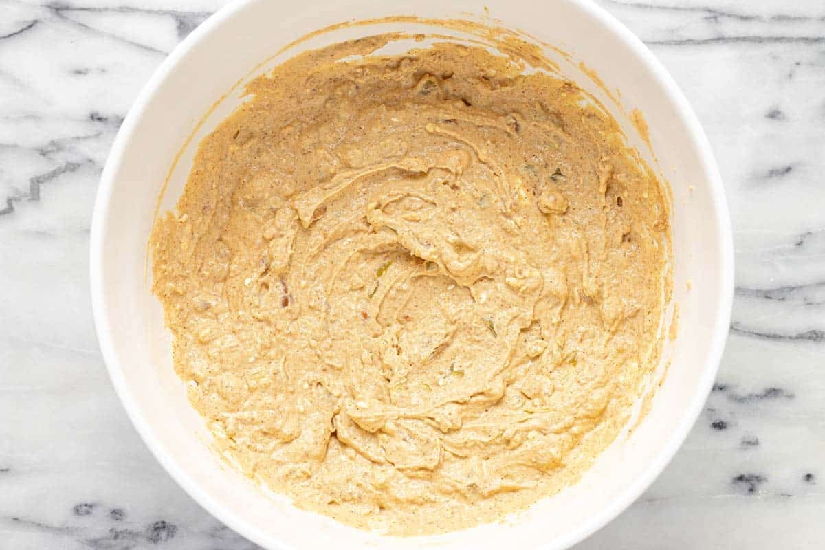 Creamy bean dip mixed together in a large bowl. 
