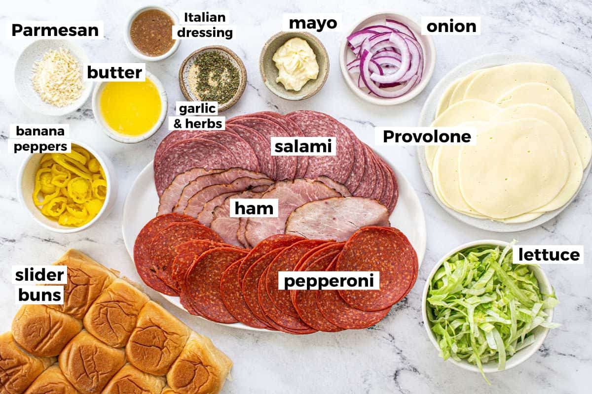 Bowls of ingredients to make Italian sliders. 