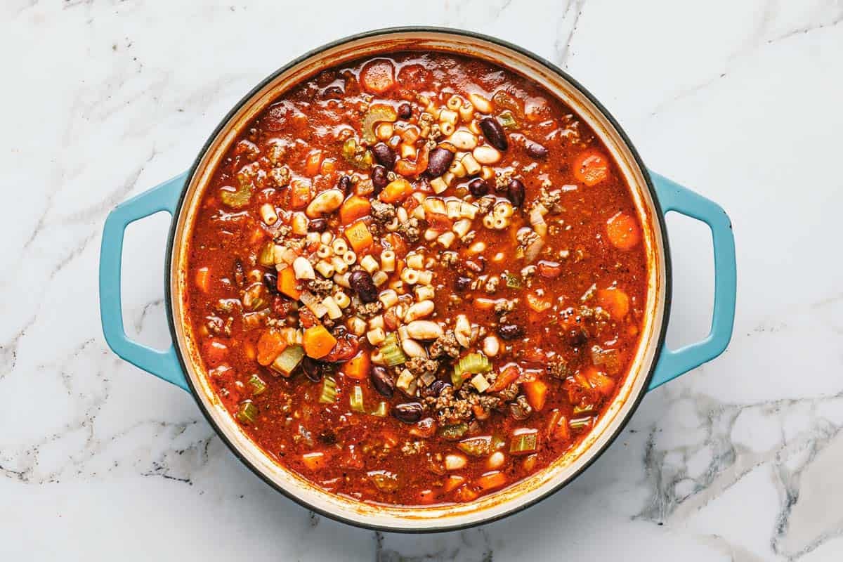 Large pot filled with Italian pasta fagioli. 