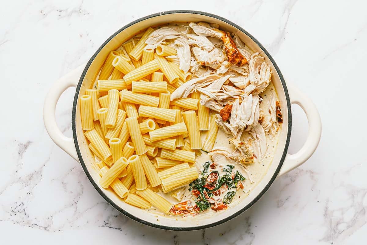 Shredded chicken and pasta added to a creamy Tuscan sauce. 