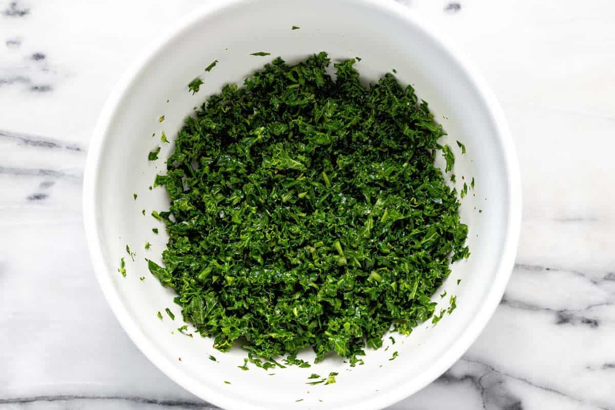 Bowl of massaged and wilted kale. 