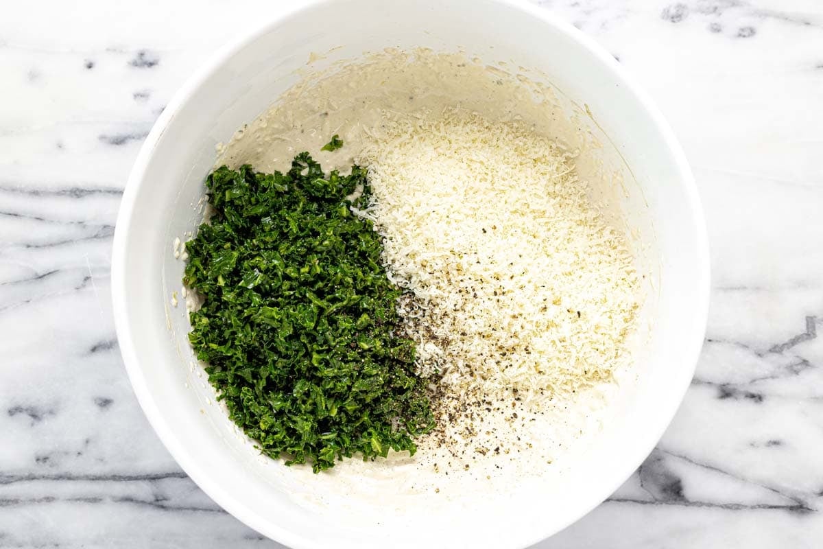 Massaged kale and grated Parmesan added to Caesar dip. 