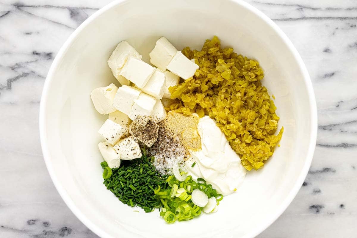 Bowl of ingredients to make pepperoncini dip. 