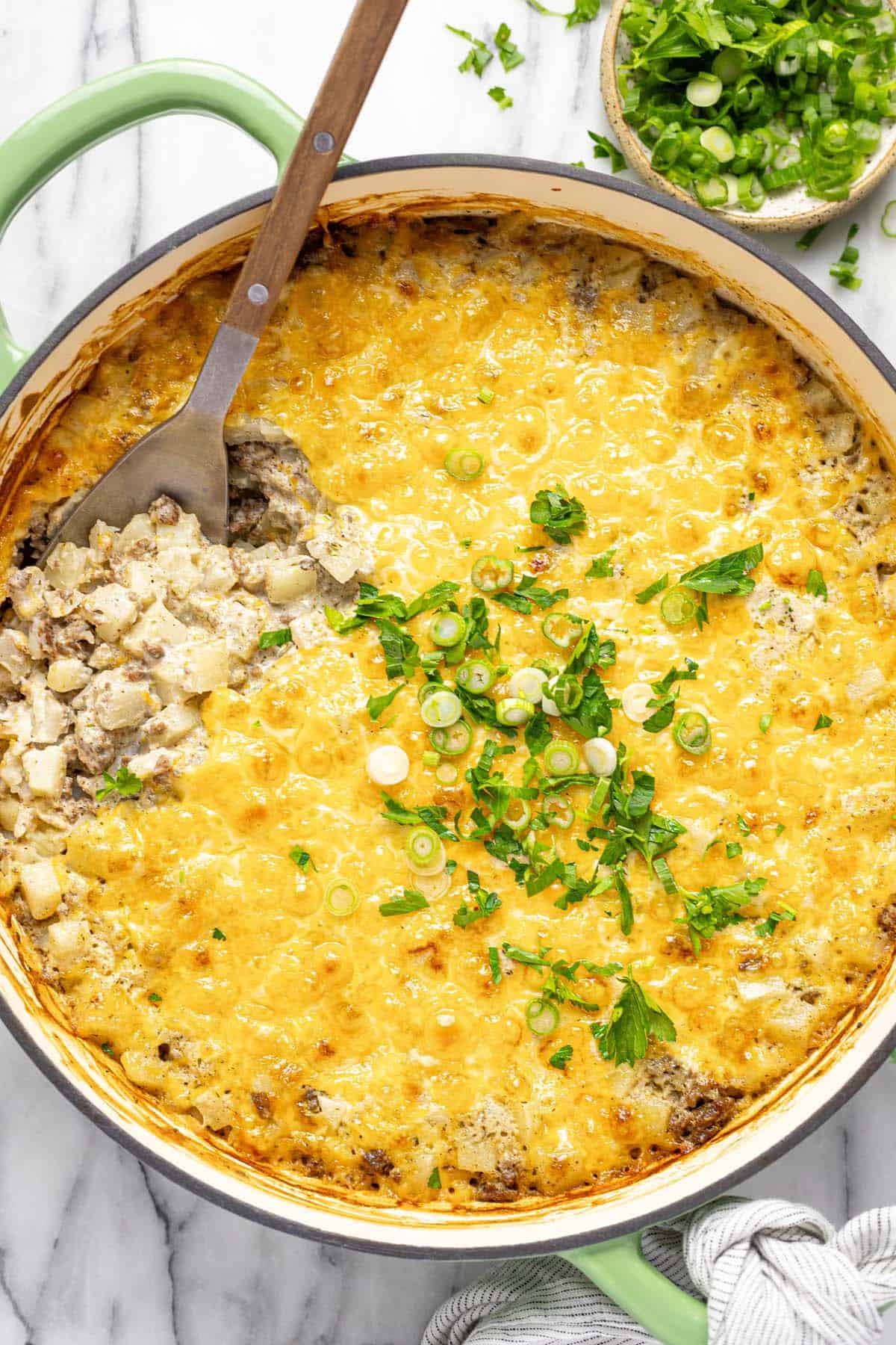 Large pan filled with creamy hamburger and potato casserole. 
