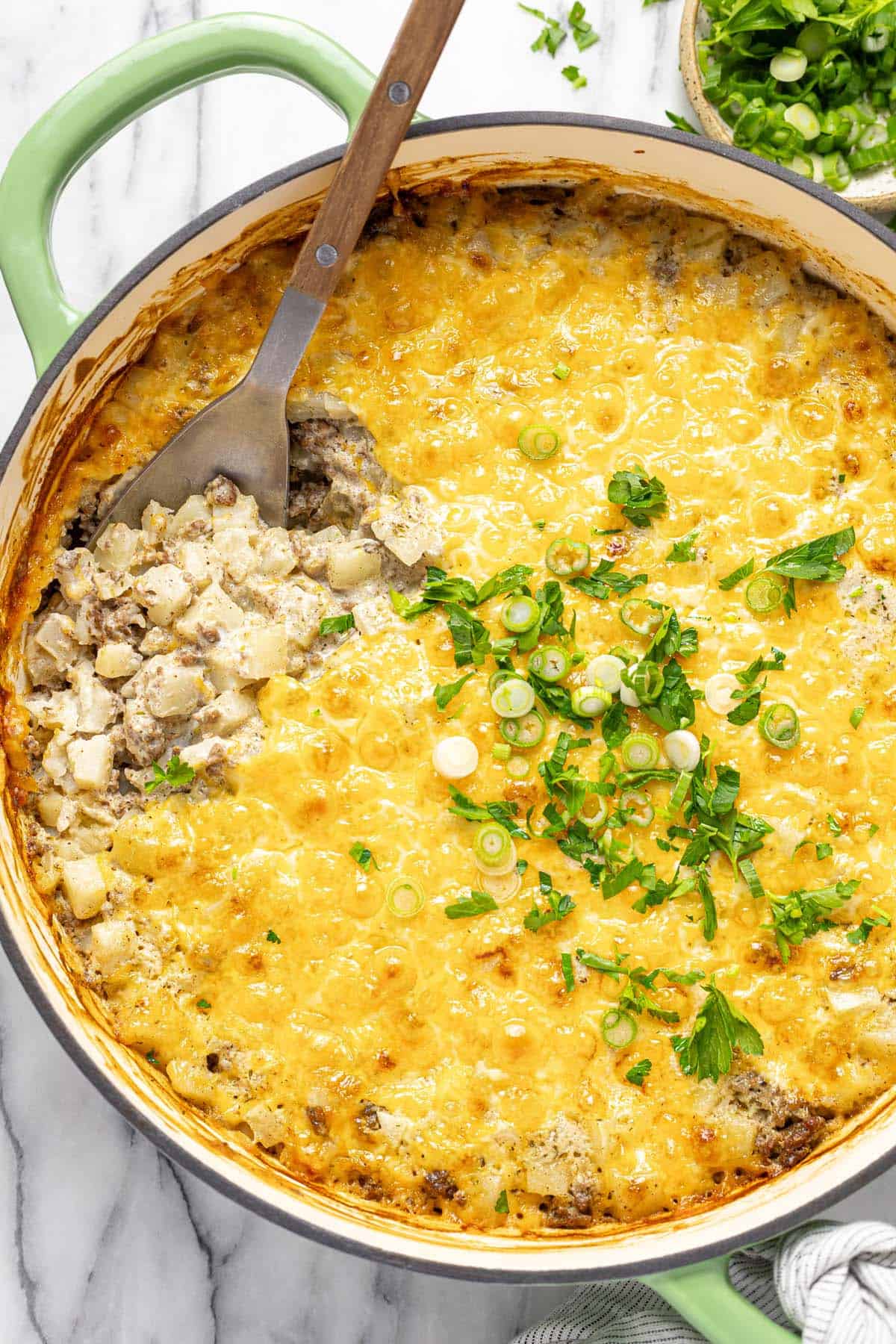 Large pan filled with creamy hamburger and potato casserole. 