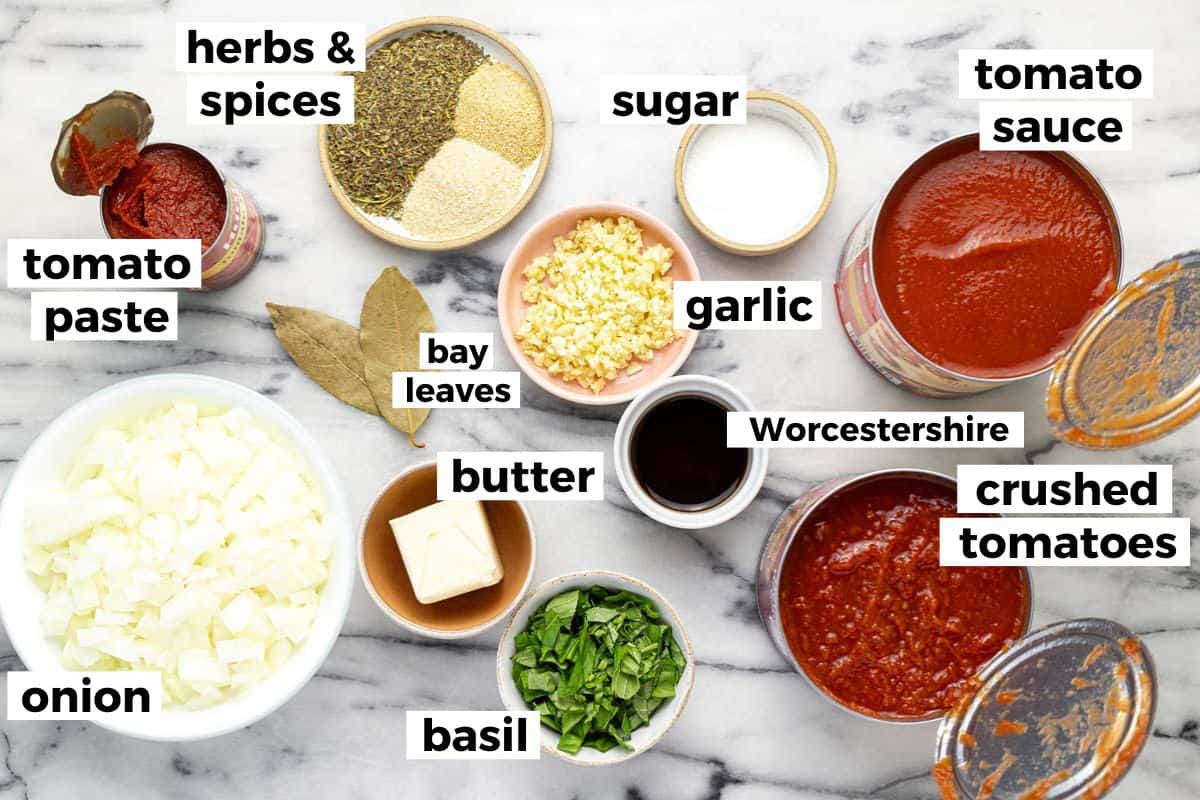 Bowls of ingredients to make homemade pasta sauce. 