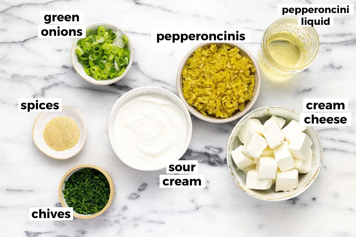 Bowls of ingredients to make pepperoncini dip. 