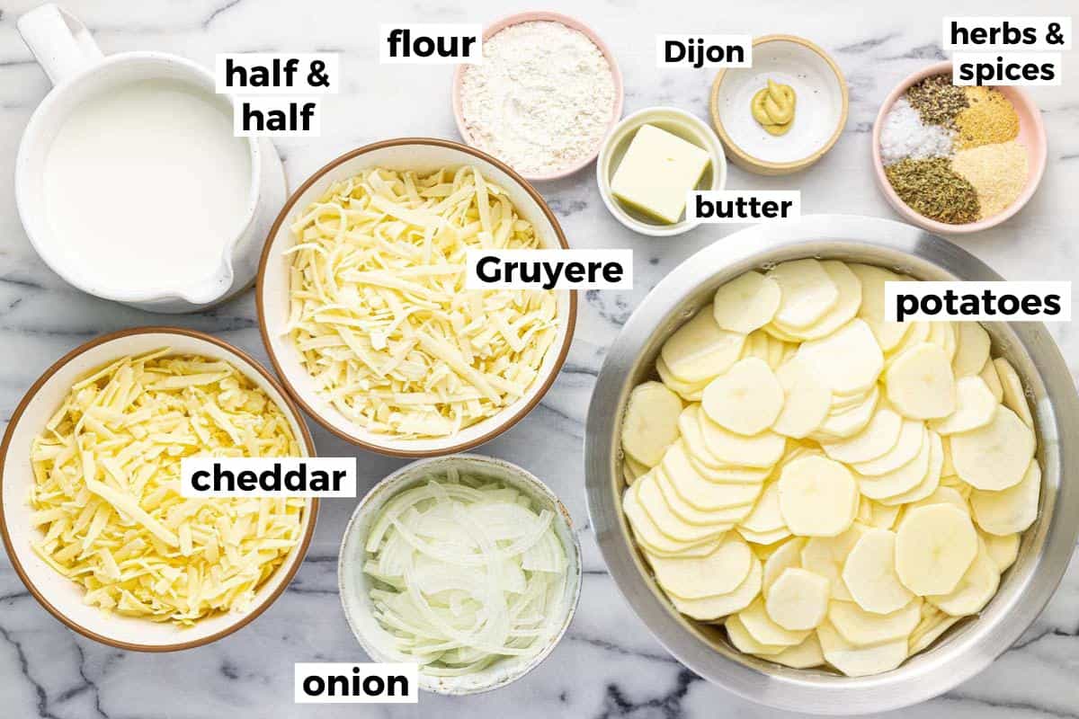 Bowls of ingredients to make au gratin potatoes. 