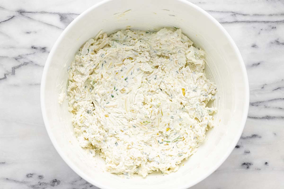 Bowl filled with freshly mixed pepperoncini dip.