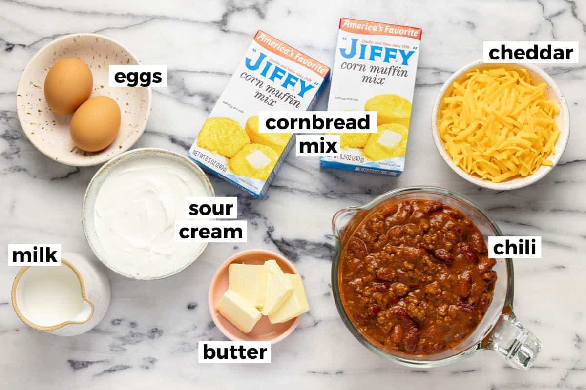 Bowls of ingredients to make chili and cornbread casserole.