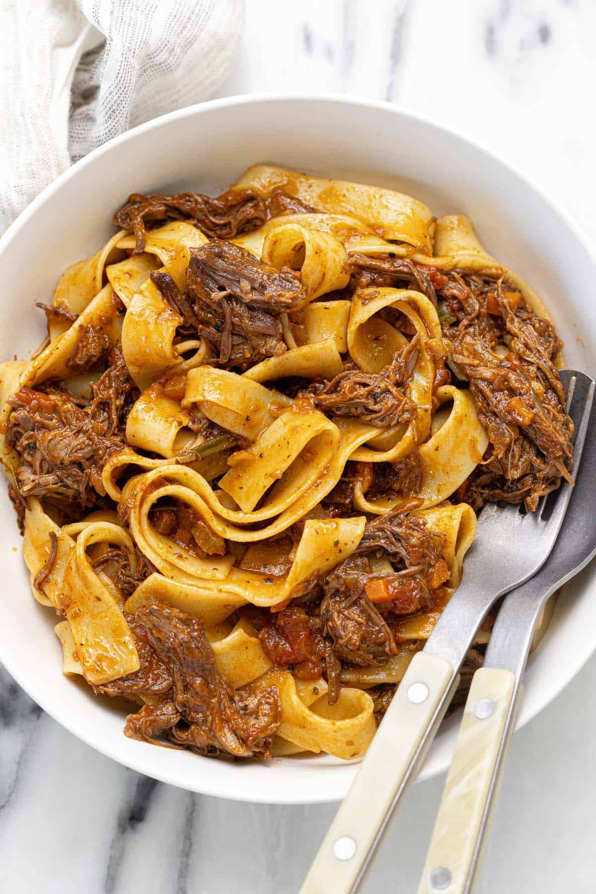 Pappardelle pasta tossed in short rib ragu sauce. 