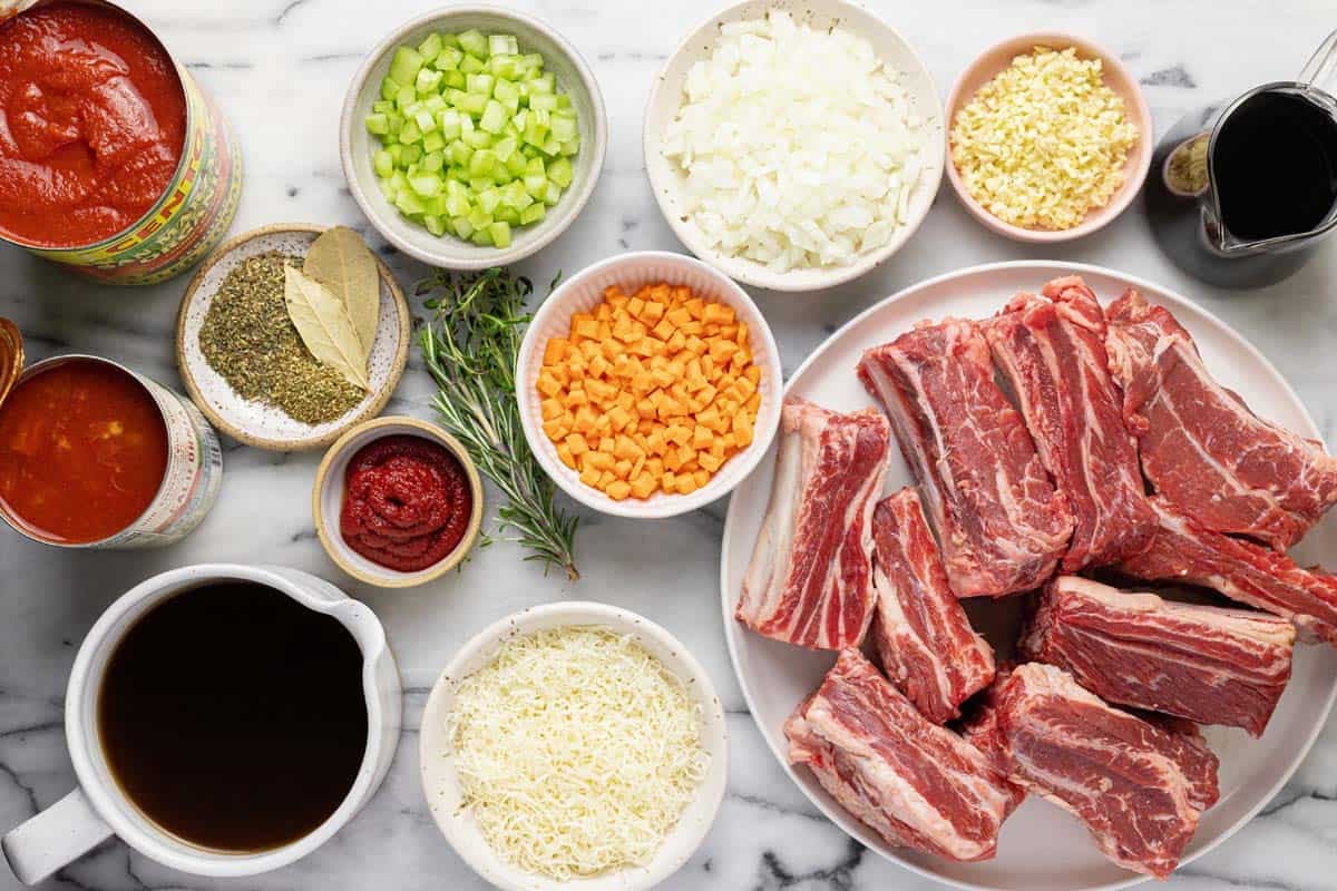 Bowls of ingredients to make short rib beef ragu. 