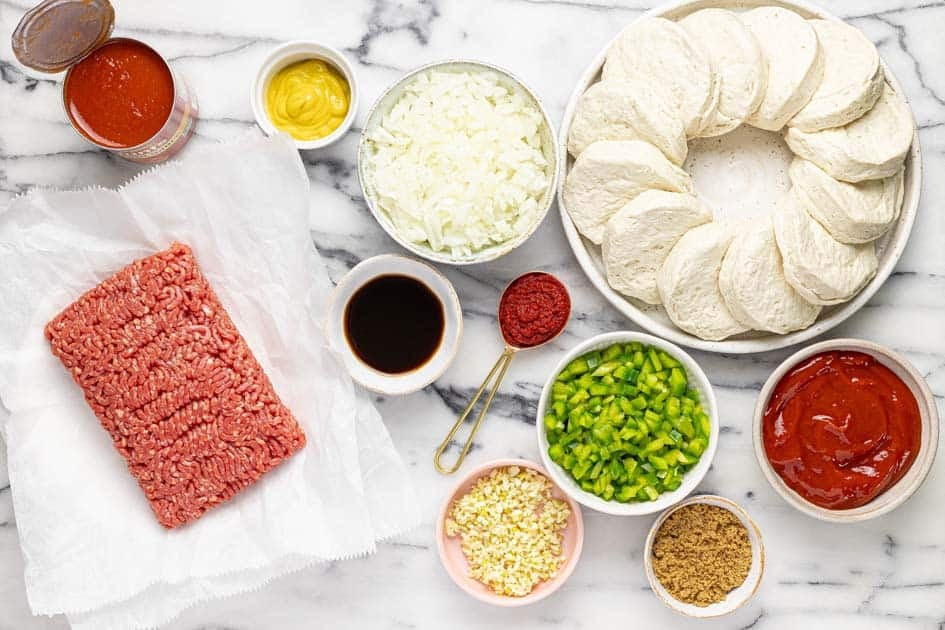 Bowls of ingredients to make sloppy joe biscuits. 