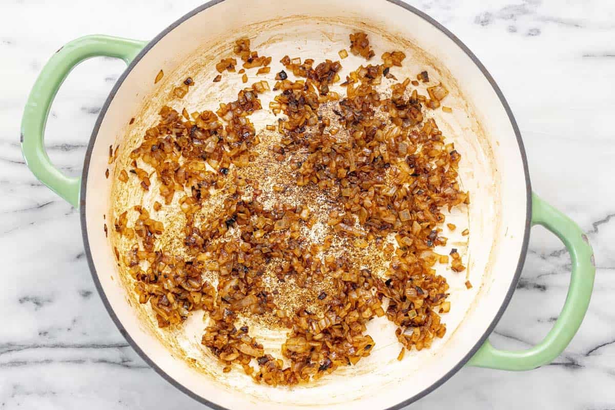 Caramelized onions in a large pan.