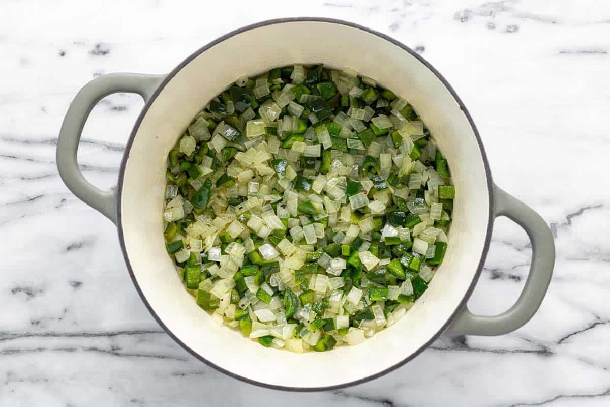 Sauteed diced veggies in a large pot.