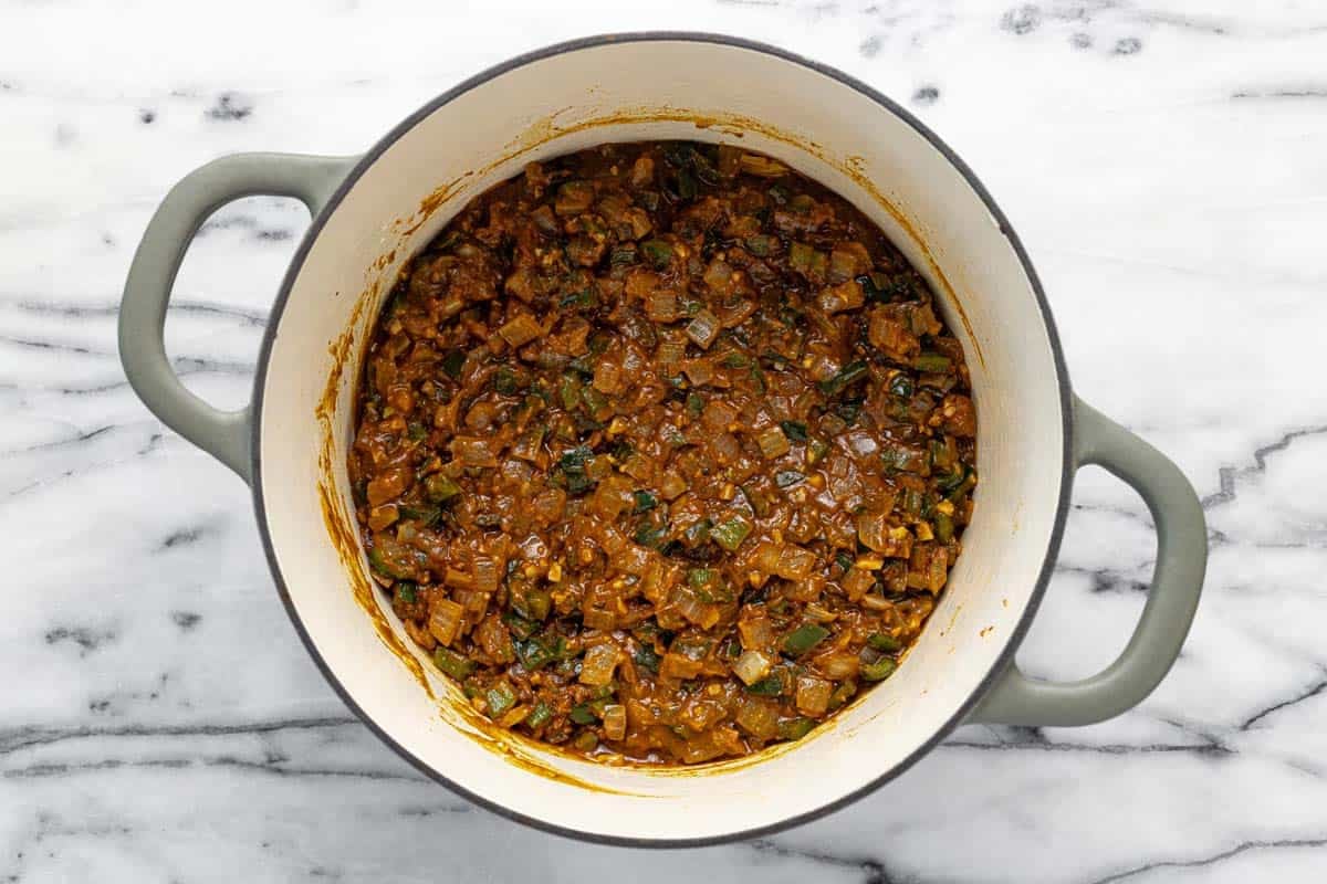 The creamy base of the poblano soup with onion, pepper, and spices.