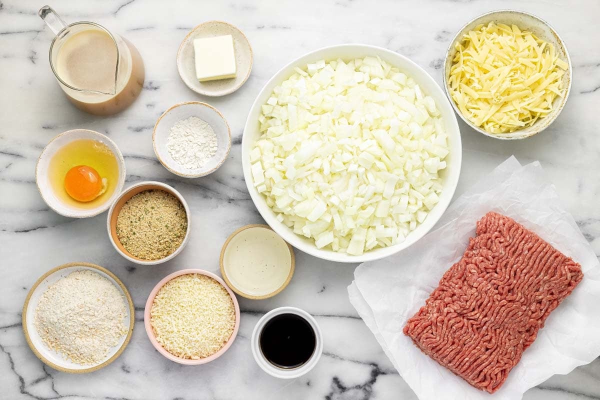 Bowls of ingredients to make French onion mini meatloaf.