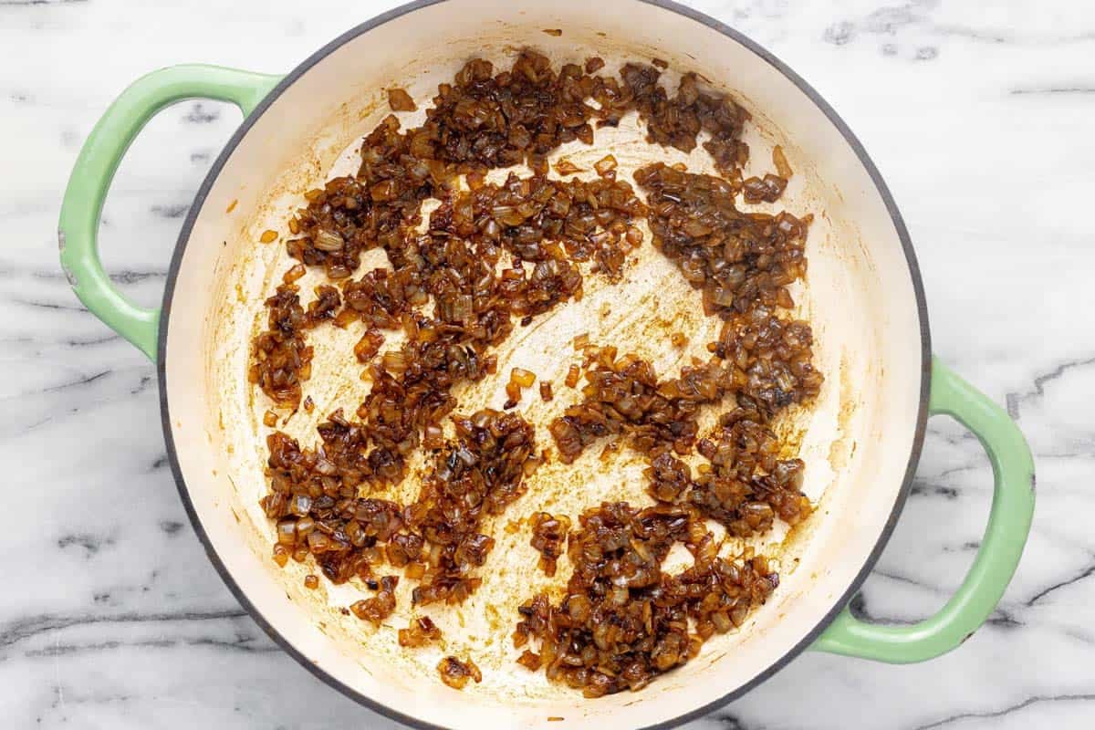 Large pan filled with caramelized onions.