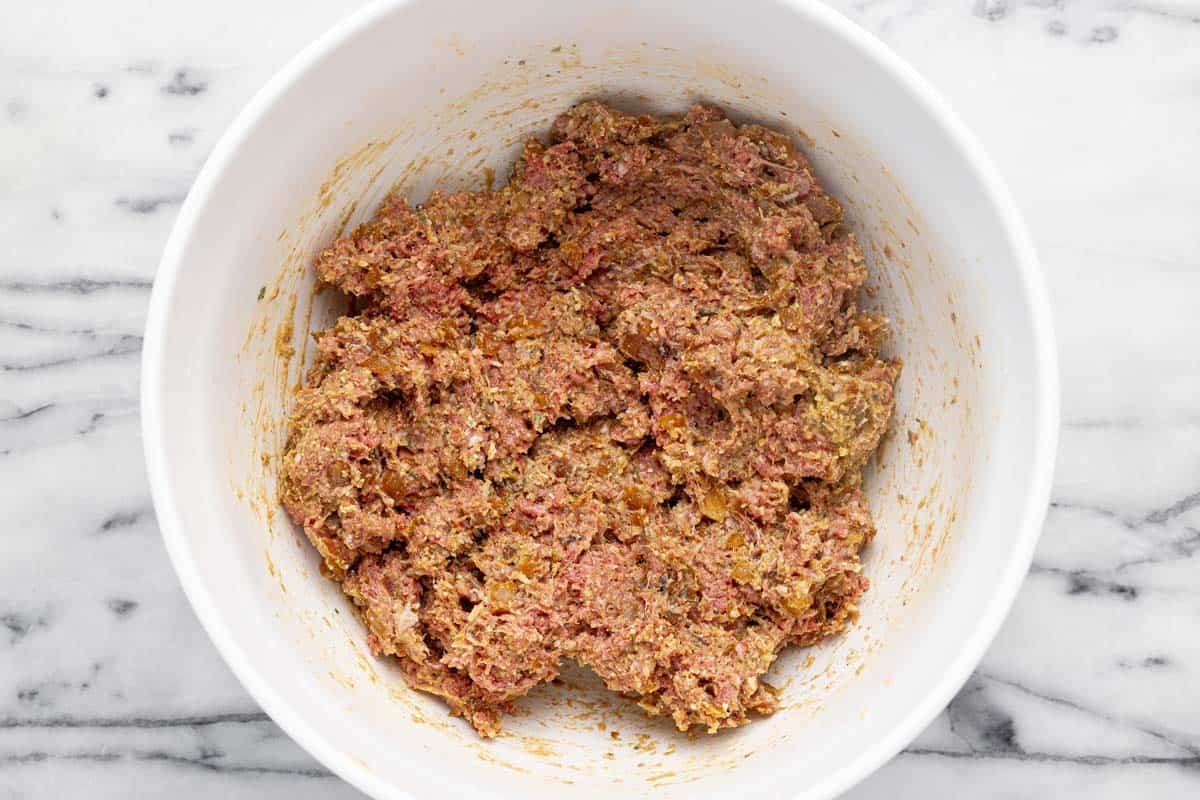 Meatloaf ingredients mixed together in a large bowl.