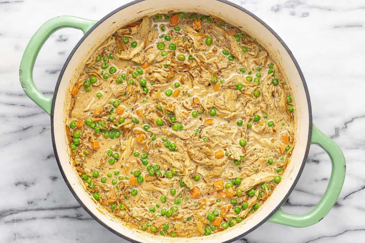 French onion chicken pot pie filling in a large pan.