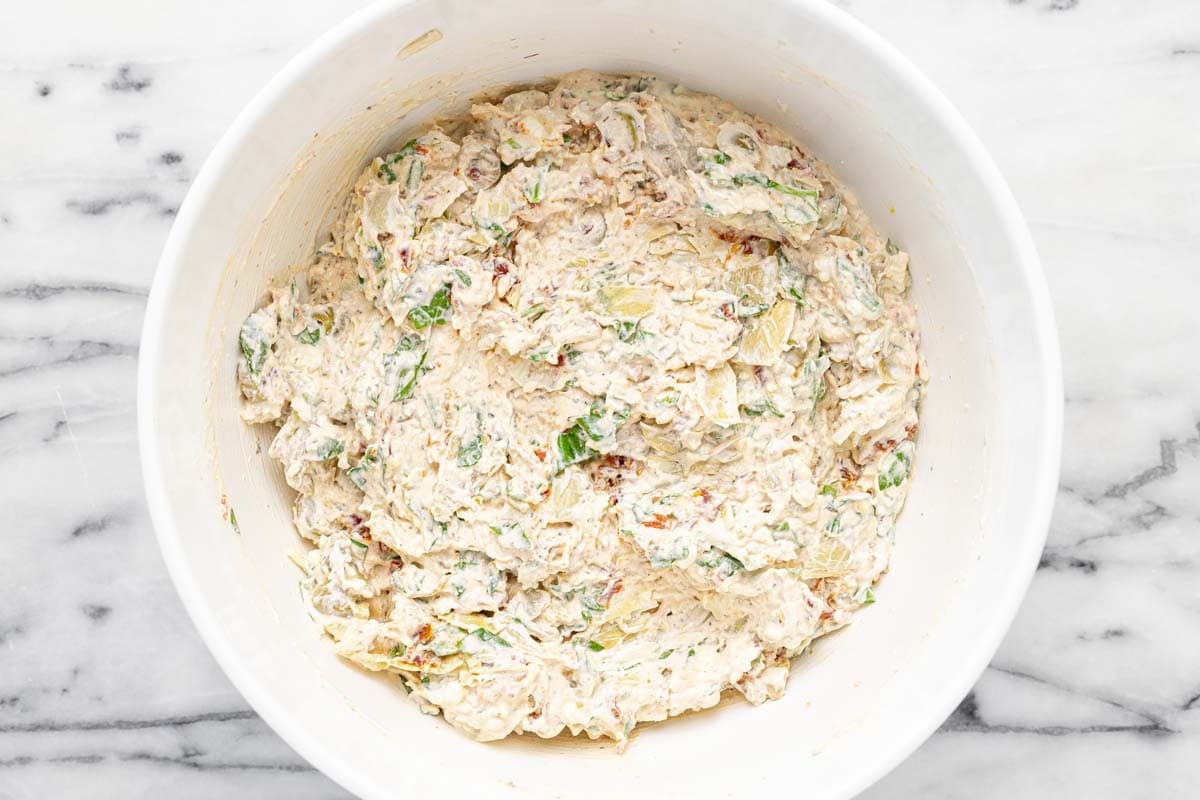 Creamy cheese and veggie filling for Greek garlic cheese bread.