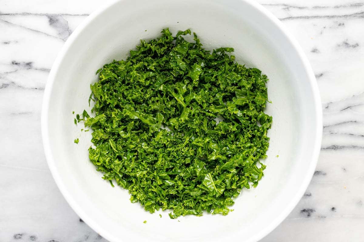 Bowl filled with massaged kale.