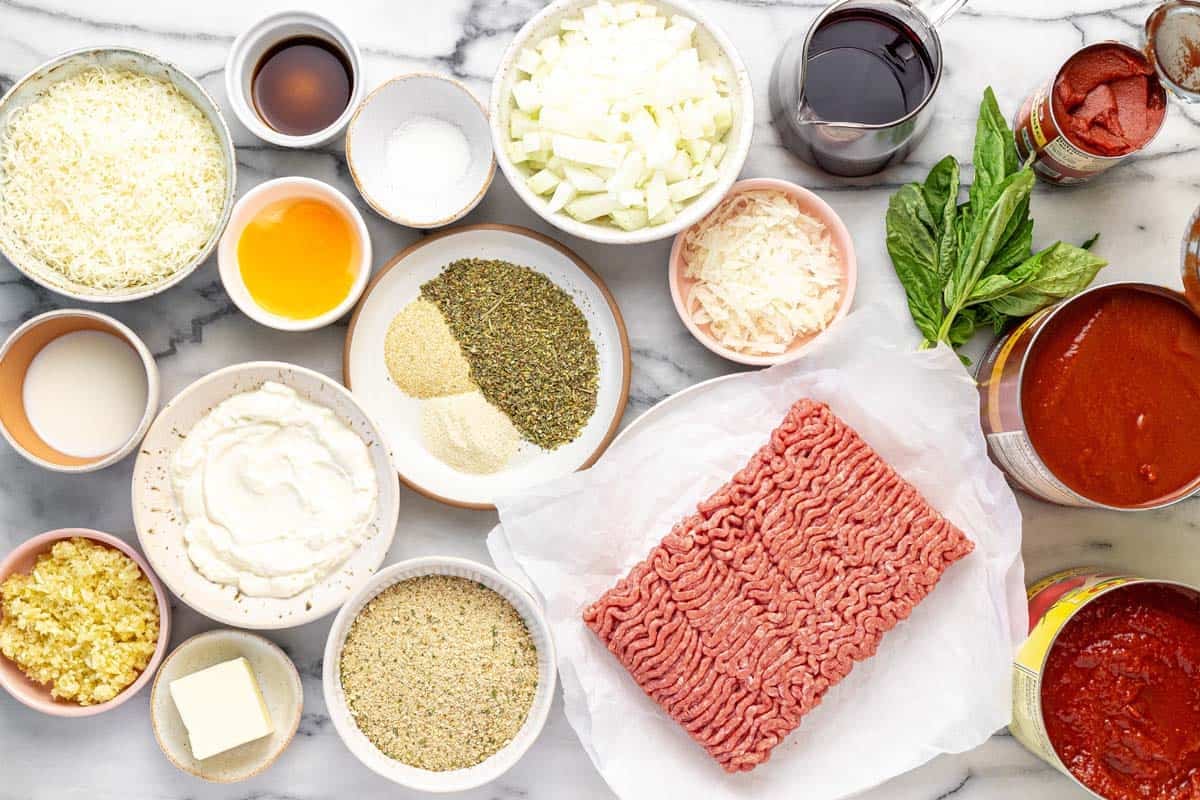 Bowls of ingredients to make stovetop meatballs.