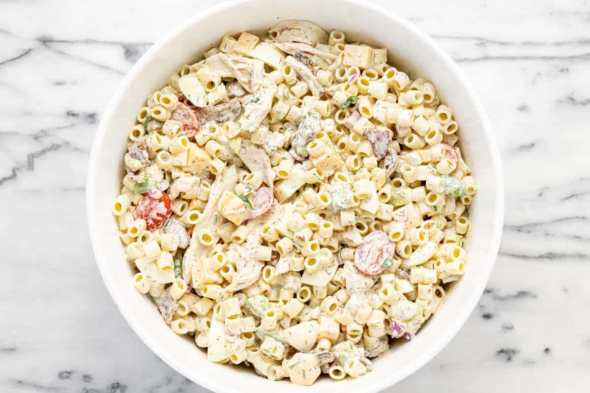 Large bowl filled with cobb pasta salad.