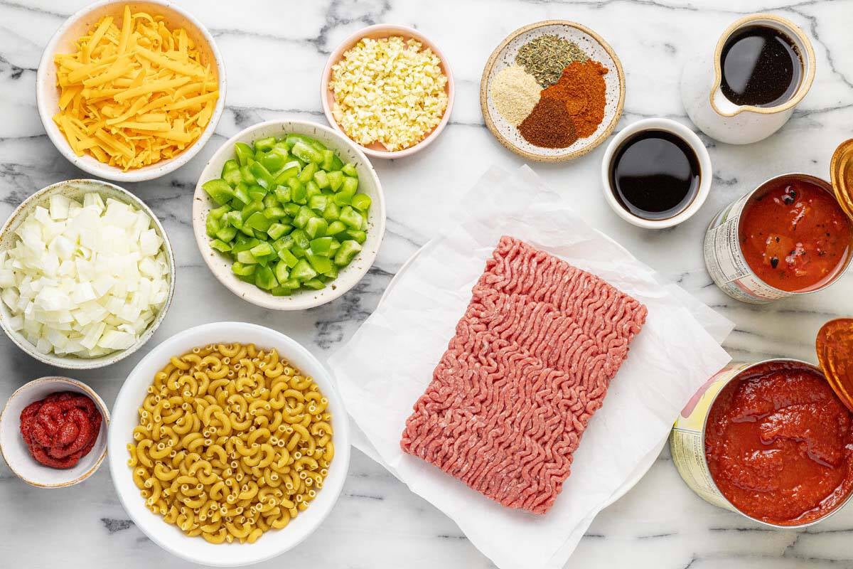 Bowls of ingredients to make American goulash.