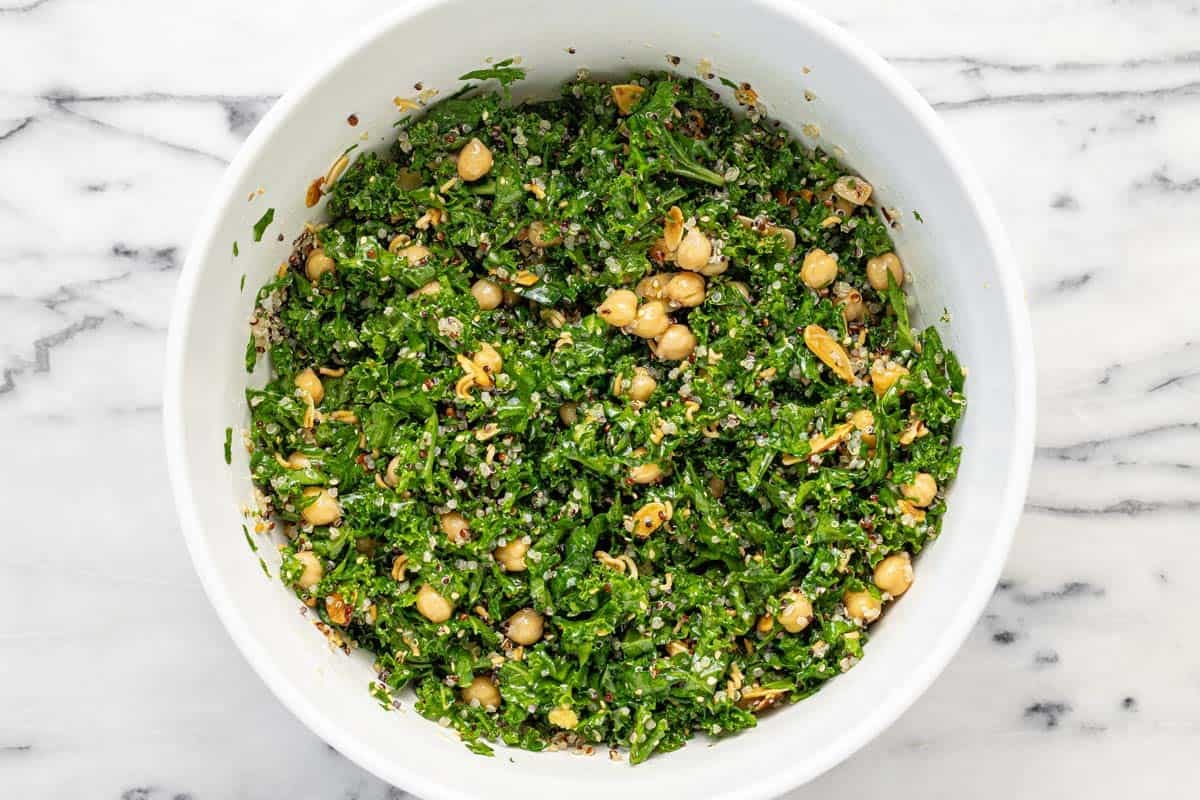 Homemade sesame kale and quinoa salad in a large bowl.