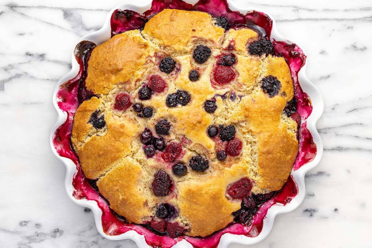 Homemade triple berry cobbler fresh from the oven.