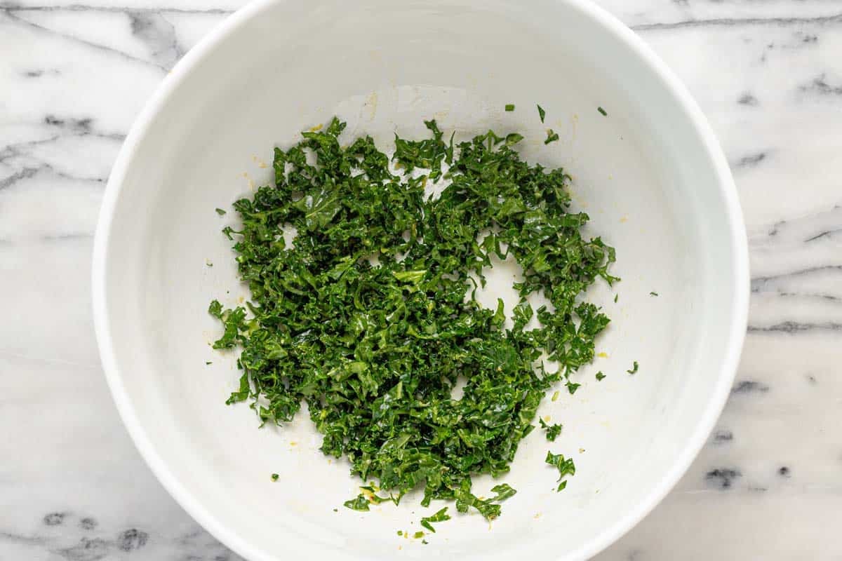 Massaged kale in a large bowl.