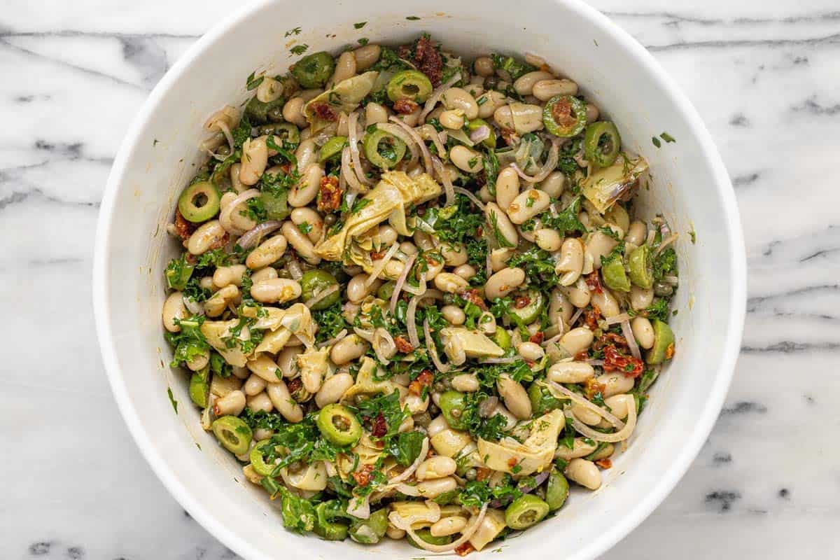 Homemade Greek white bean salad in a large bowl.