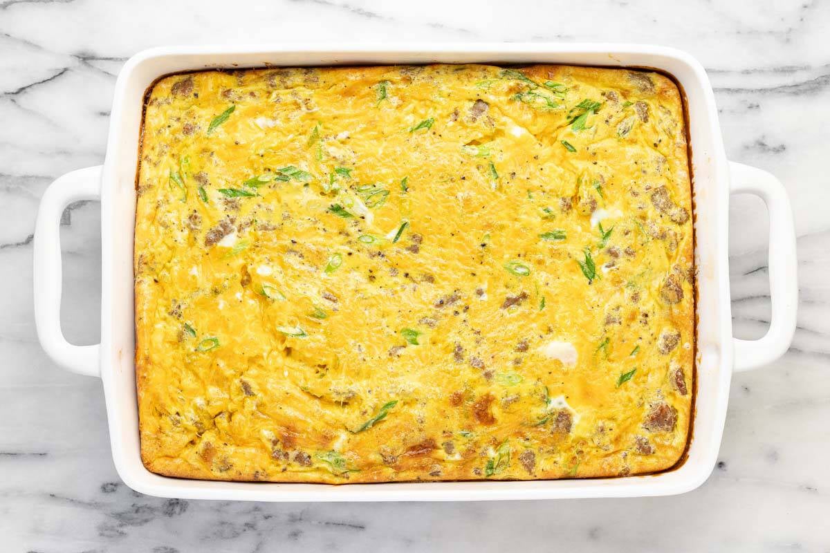 Breakfast casserole baked in a 9x13 baking dish.