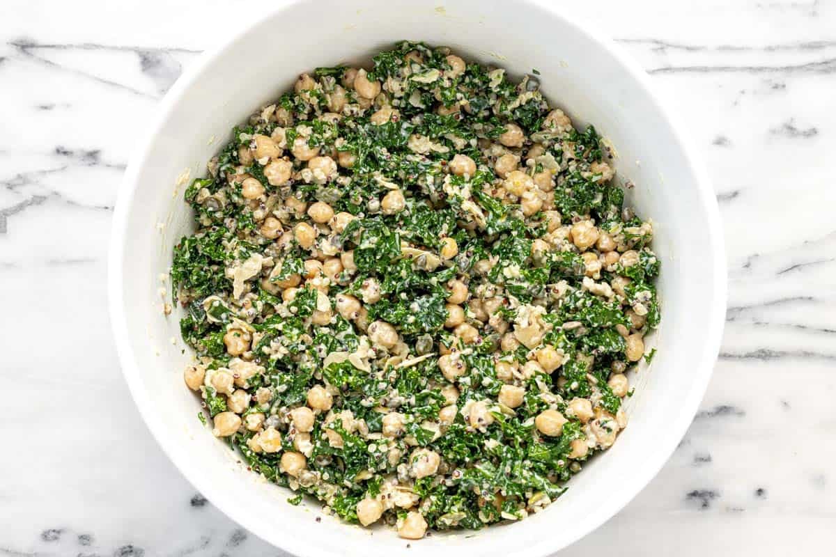 Dense bean Caesar salad in a large bowl.