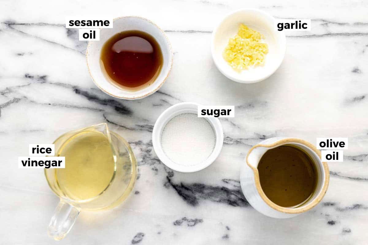 Bowls of ingredients to make homemade sesame dressing.