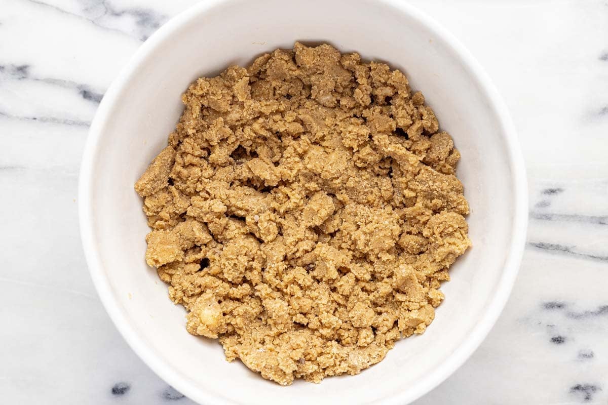 Bowl filled with homemade crumble topping.