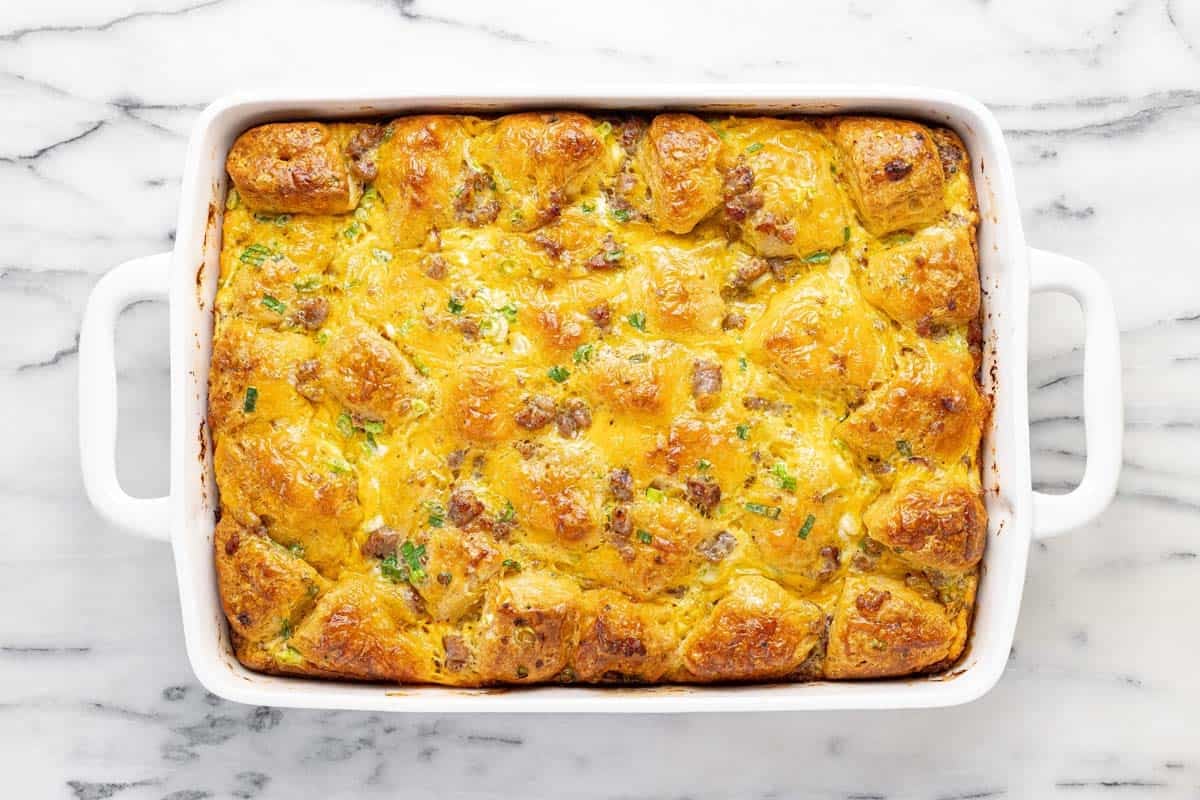 Freshly made biscuit breakfast bake in a large baking dish.