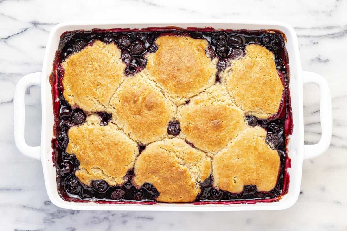Freshly baked cherry cobbler in a large baking dish.