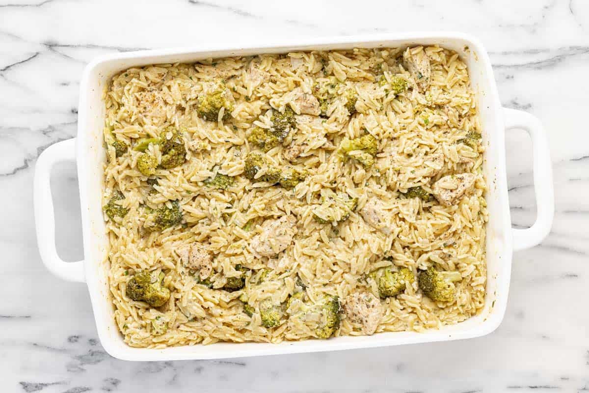 Baked Boursin chicken and orzo in a large casserole dish.