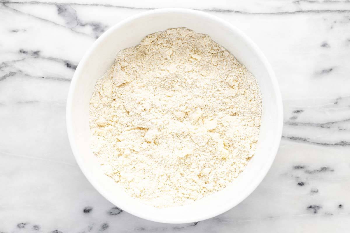 Dry cobbler biscuit ingredients with butter cut in. 