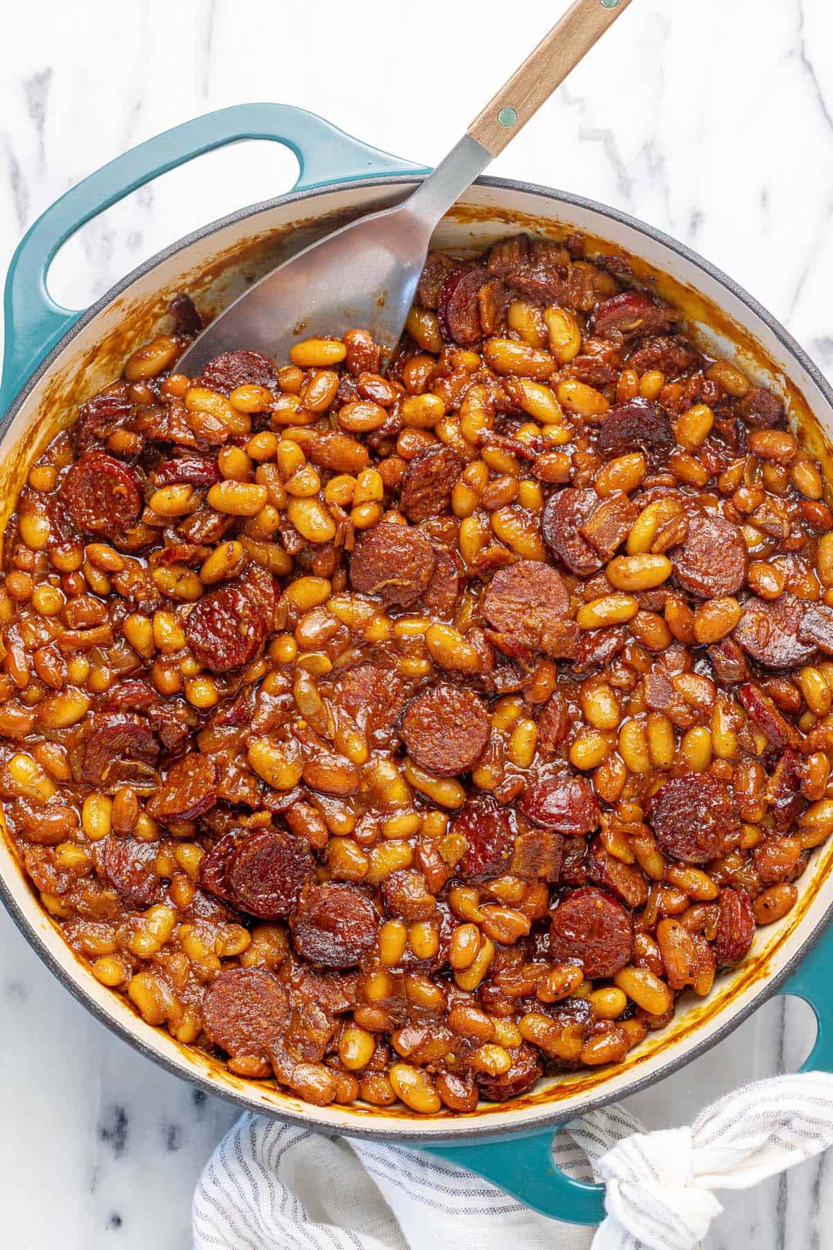 Large pot filled with homemade baked beans.