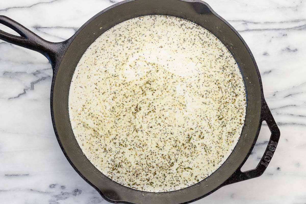 Large skillet with the base for the chicken pot pie filling.