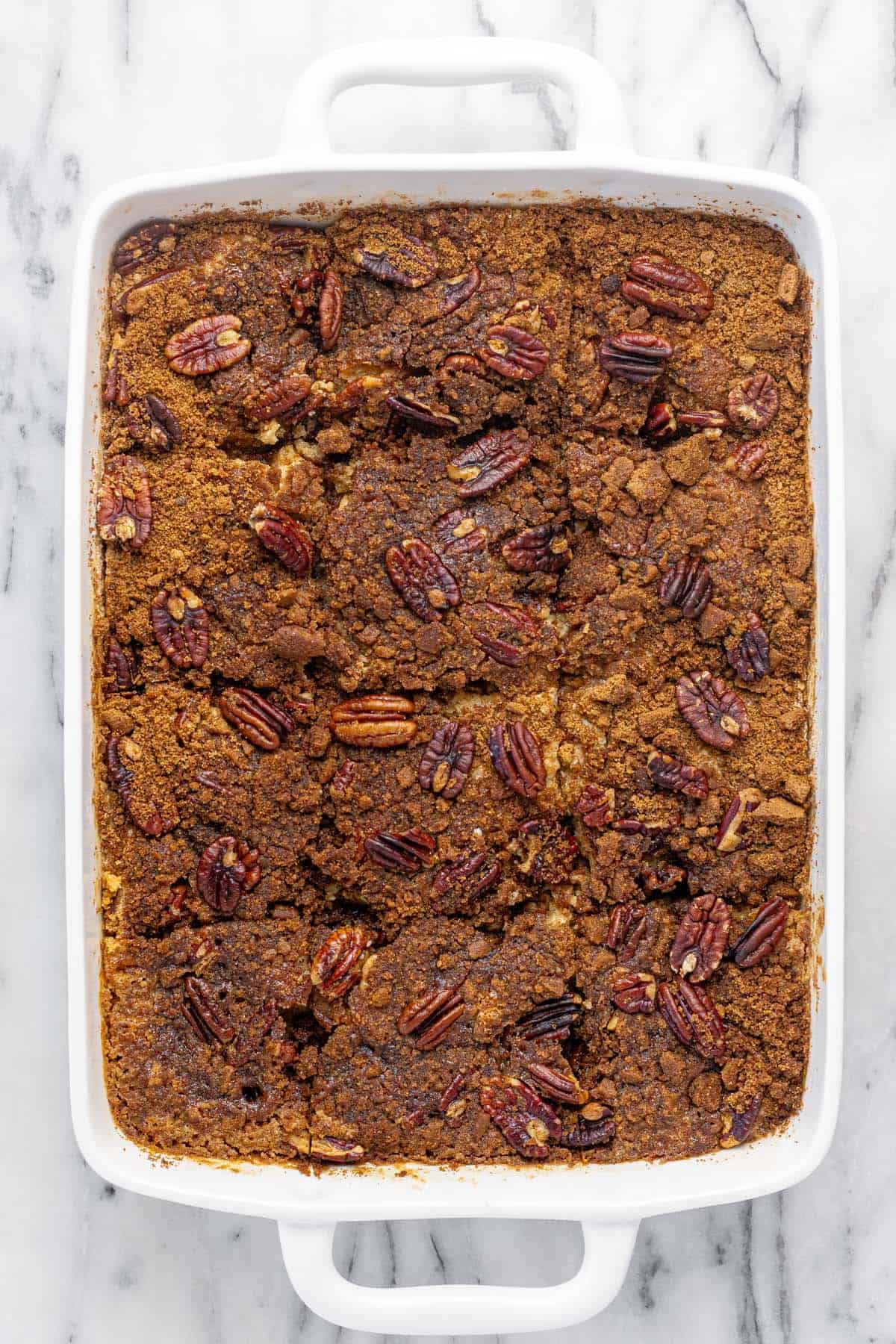 Freshly baked pumpkin dump cake in a baking dish.