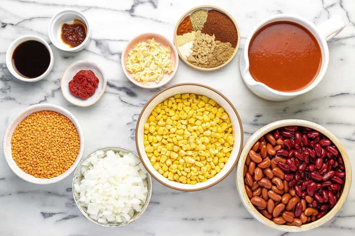 Bowls of ingredients to make easy vegetarian chili.